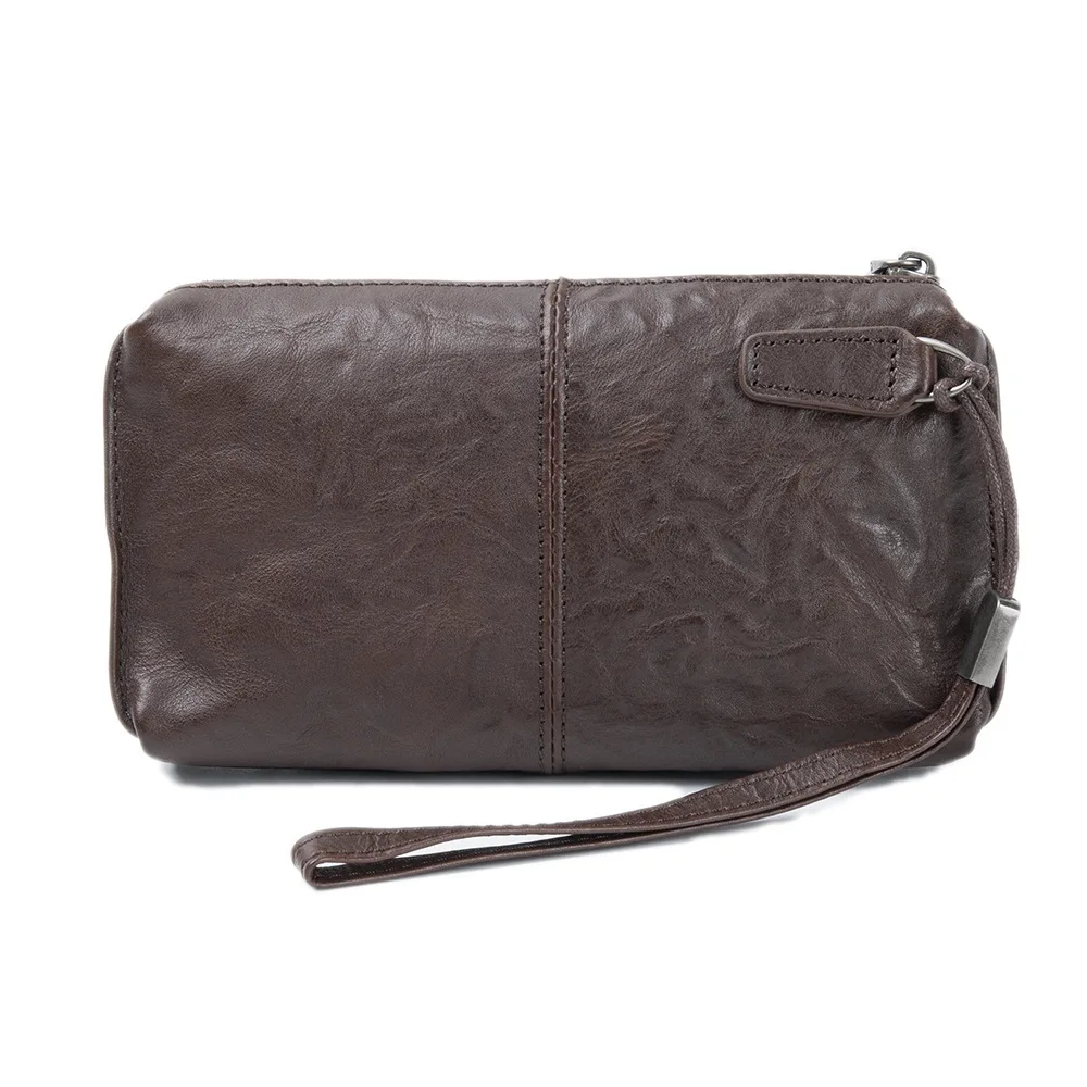 Bolso de mano de piel de vaca  - Travel Organizer Men reseña y precio